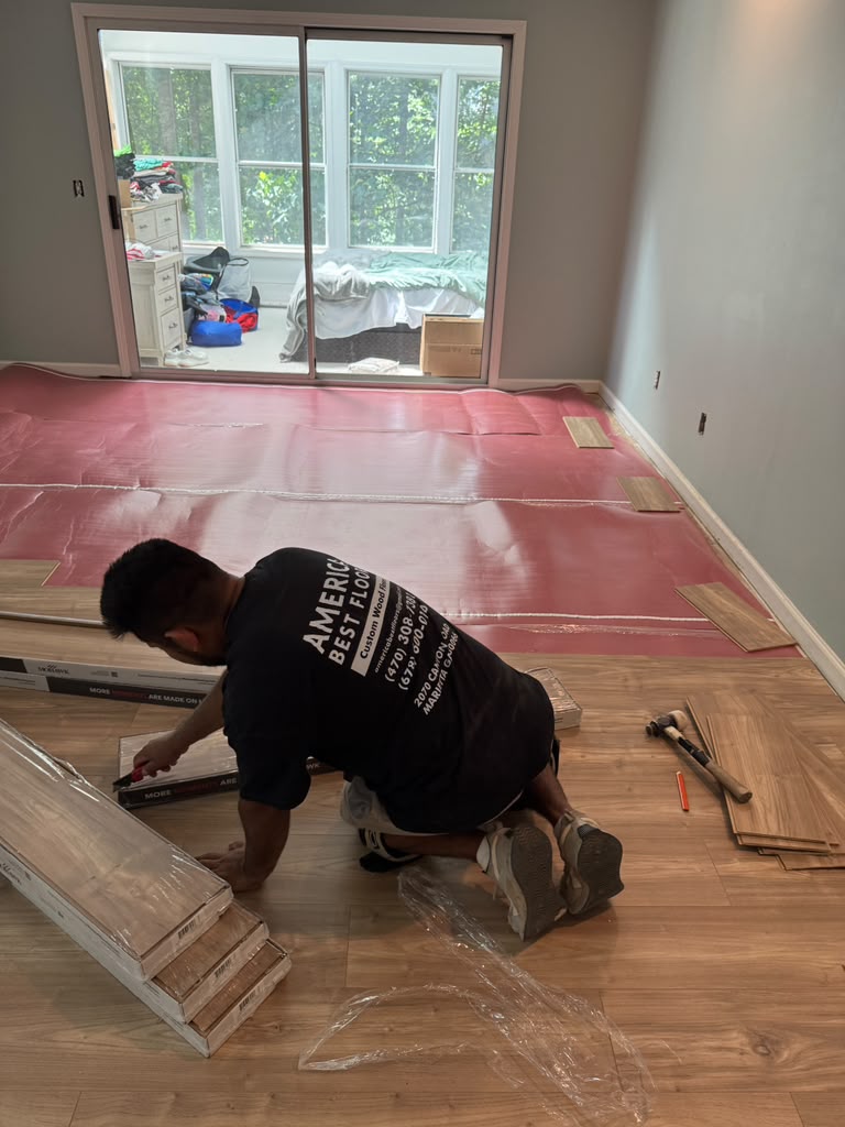 America Best Floors installer on a new construction job